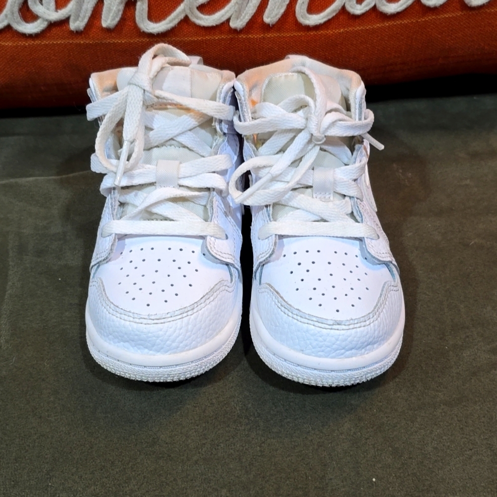 Little boys all white Jordans